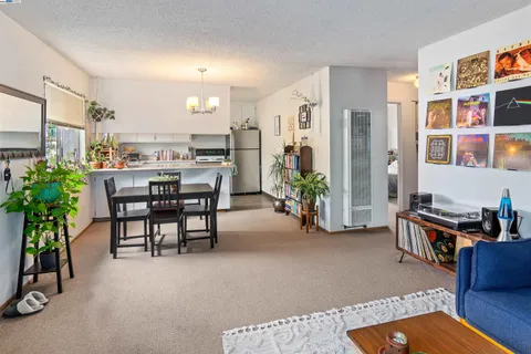 a view of a livingroom with furniture and toys