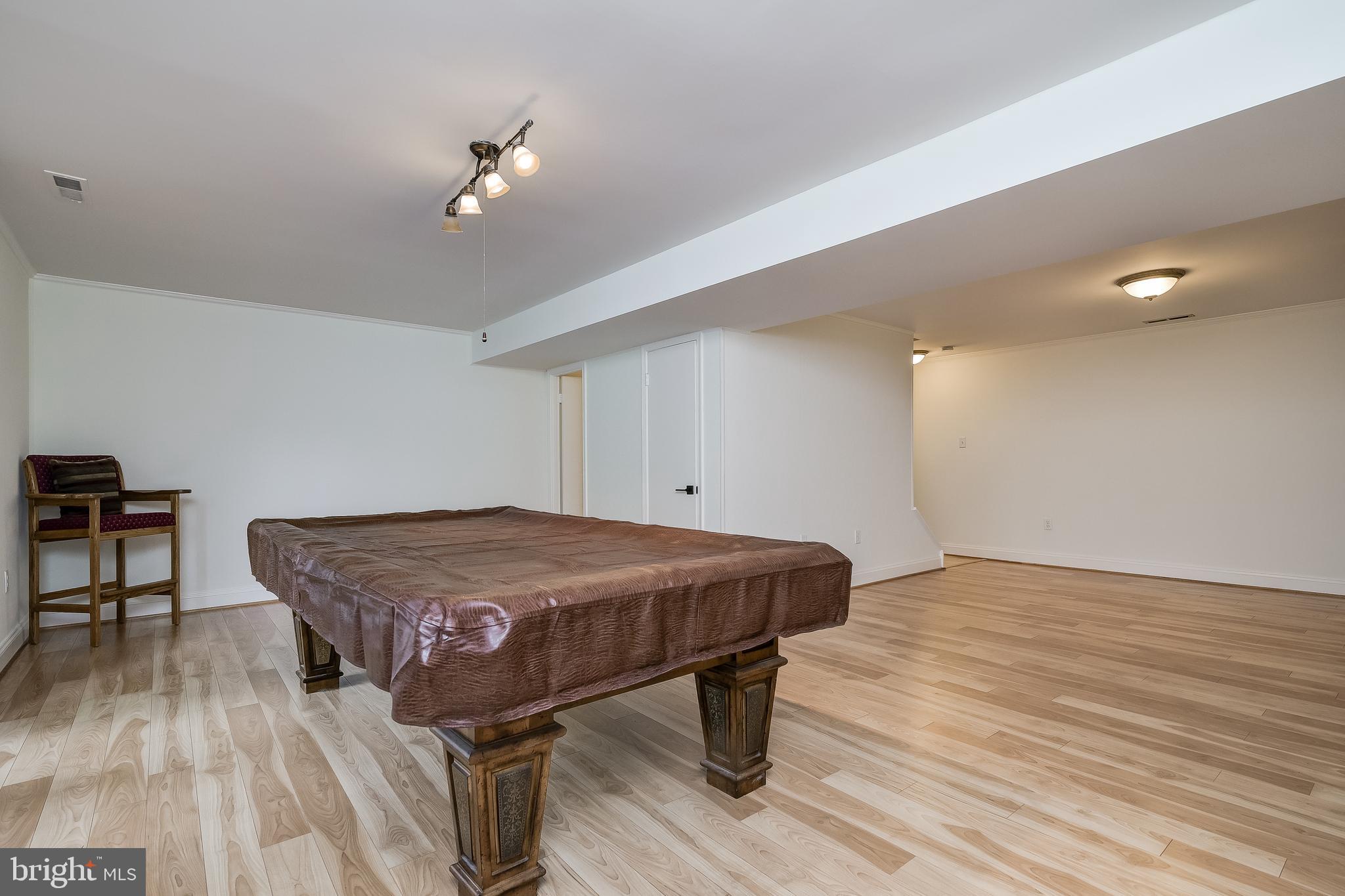 24505 Welsh Road Gaithersburg, MD 20882 - Photo 48 of 61 Lower Level Recreational Room