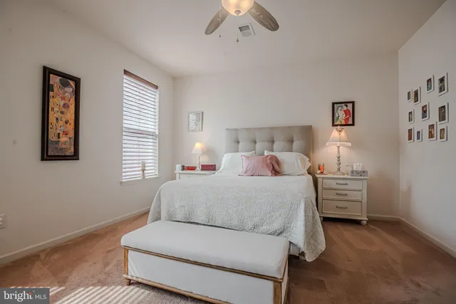 a living room with furniture couch and a window