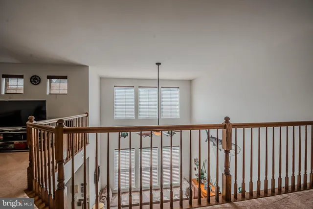 a room with furniture and a window