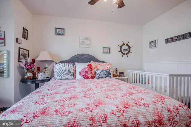 a view of house with backyard and outdoor seating