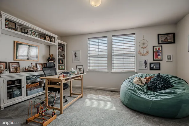 a view of a house with entertaining space