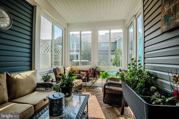 a front view of house with yard and outdoor seating