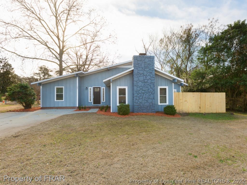 1007 Landau Road Fayetteville, NC 28311 - Photo 1 of 34 front view of a house and a yard