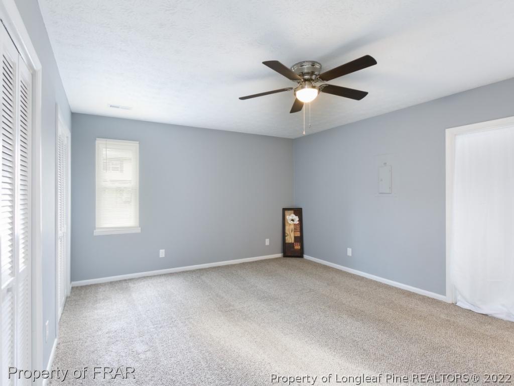 1007 Landau Road Fayetteville, NC 28311 - Photo 26 of 34 a view of an empty room with a window