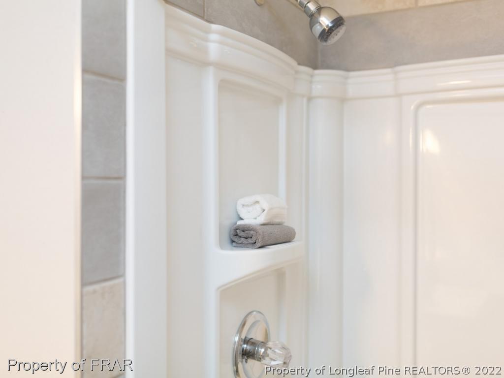 1007 Landau Road Fayetteville, NC 28311 - Photo 29 of 34 a close up of a sink and a mirror