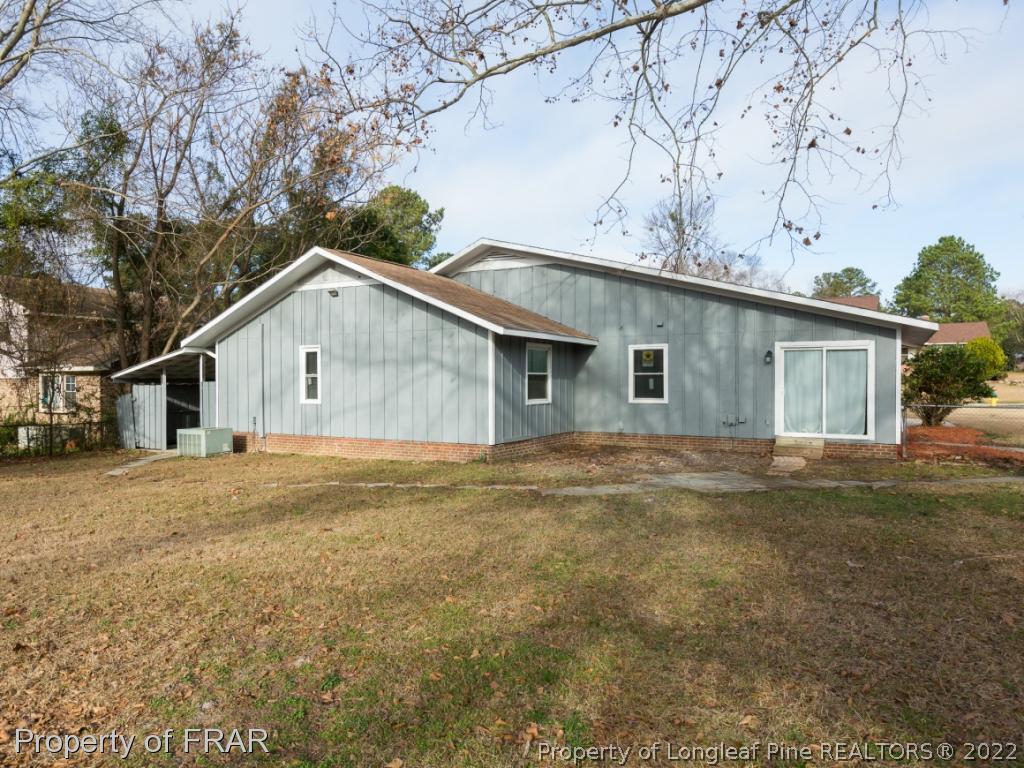 1007 Landau Road Fayetteville, NC 28311 - Photo 34 of 34 a view of a house with a yard