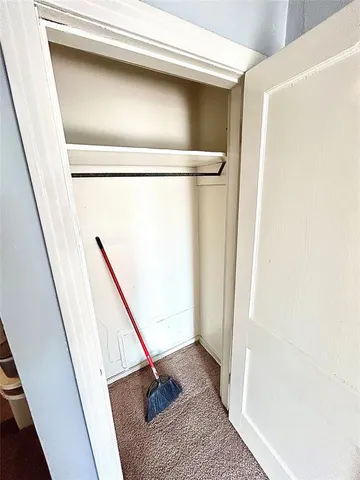 a view of a porch with wooden floor