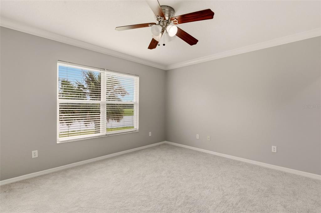 253 Bella Rosa Circle Sanford, FL 32771 - Photo 17 of 22 a view of an empty room with a window