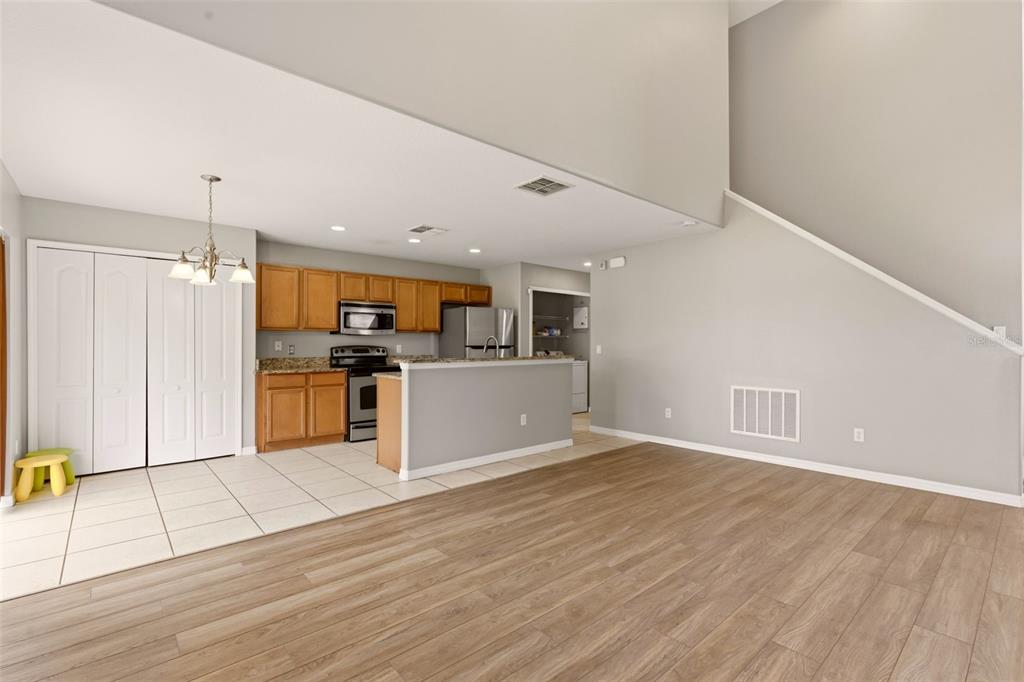 253 Bella Rosa Circle Sanford, FL 32771 - Photo 6 of 22 a view of kitchen with wooden floor