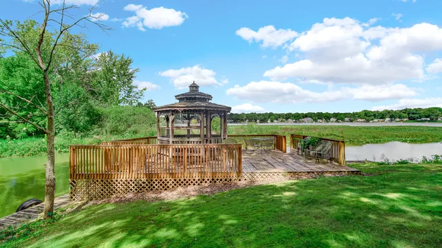 a view of a lake with a garden