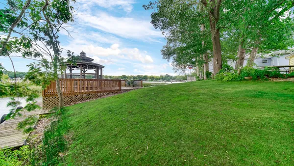 a view of a backyard with garden