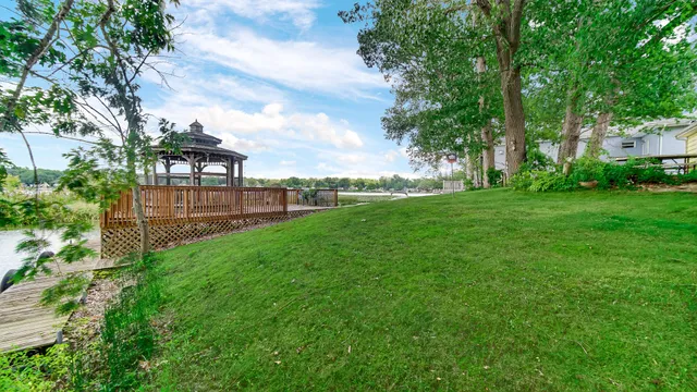 a view of a backyard with garden