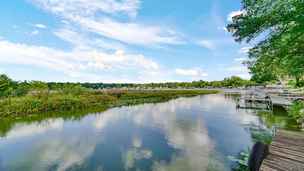 a view of a lake with a city view