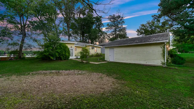 a view of a backyard with a garden