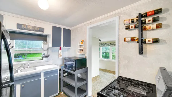 a workspace with furniture and window