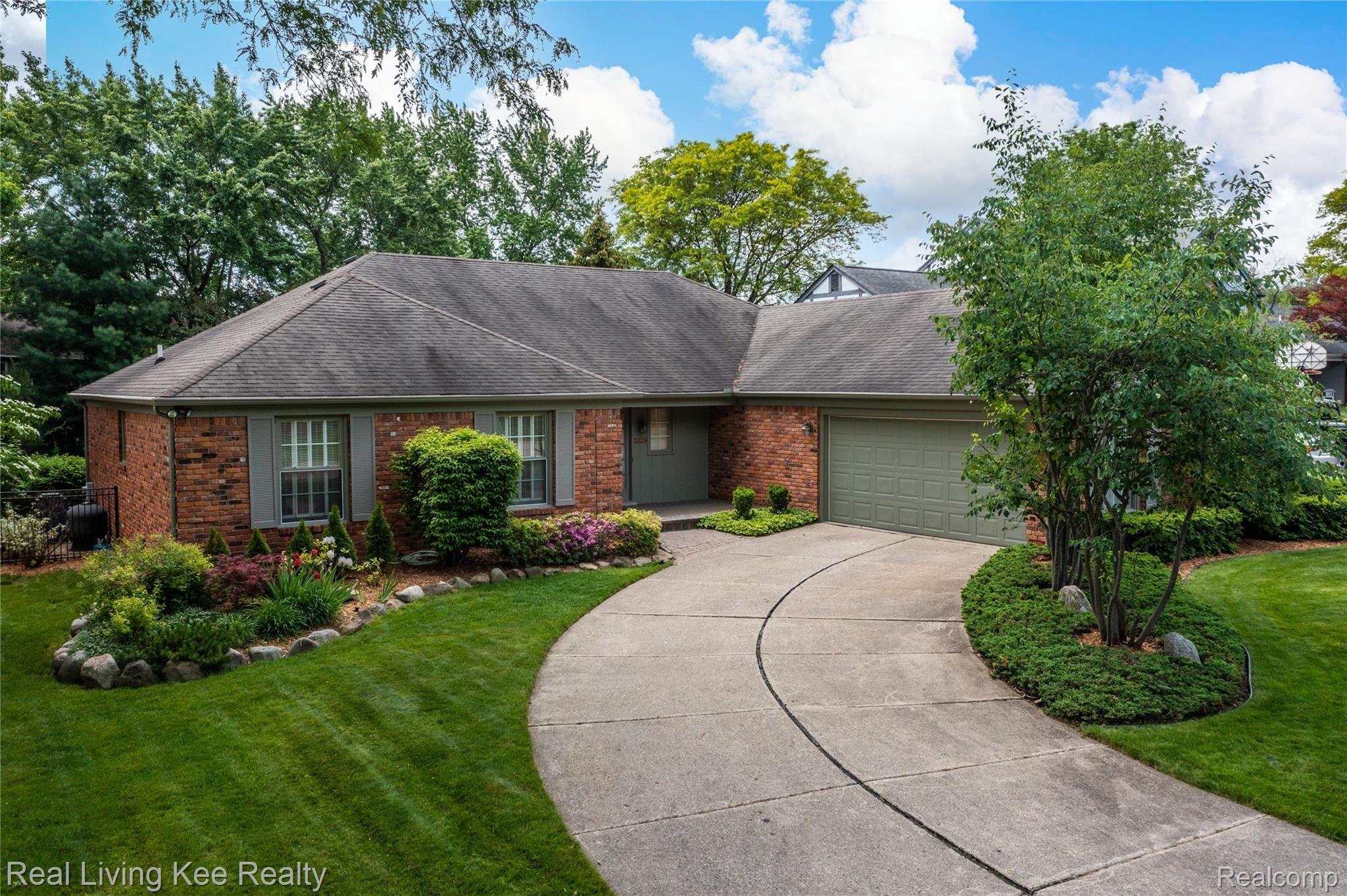 1329 Greenleaf Drive Rochester, MI 48309 - Photo 1 of 49 Traditional designed brick ranch residence boasts coined corners...hip roof...large double hung windows...and turned garage.