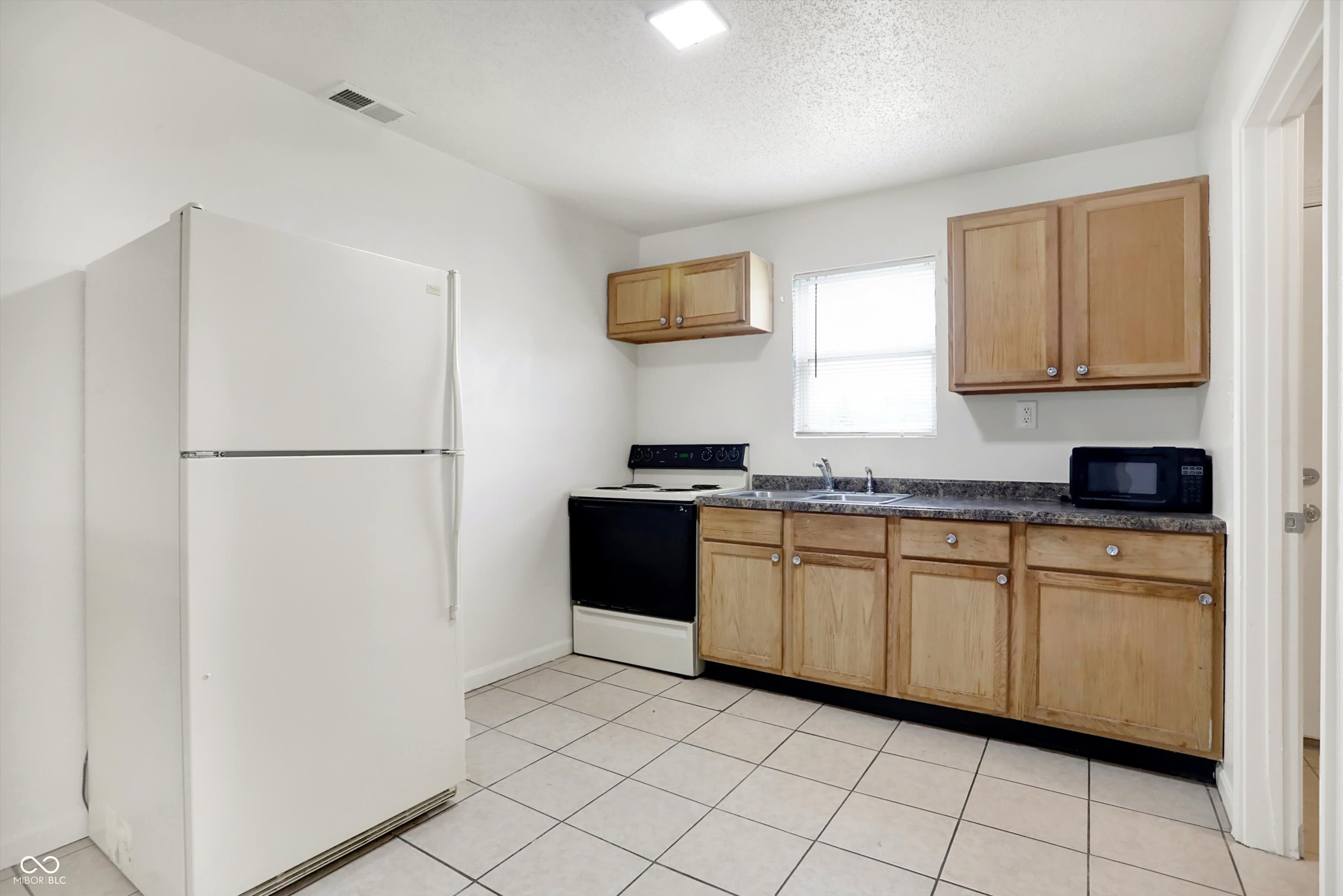 6213 Commodore Drive Indianapolis, IN 46219 - Photo 9 of 25