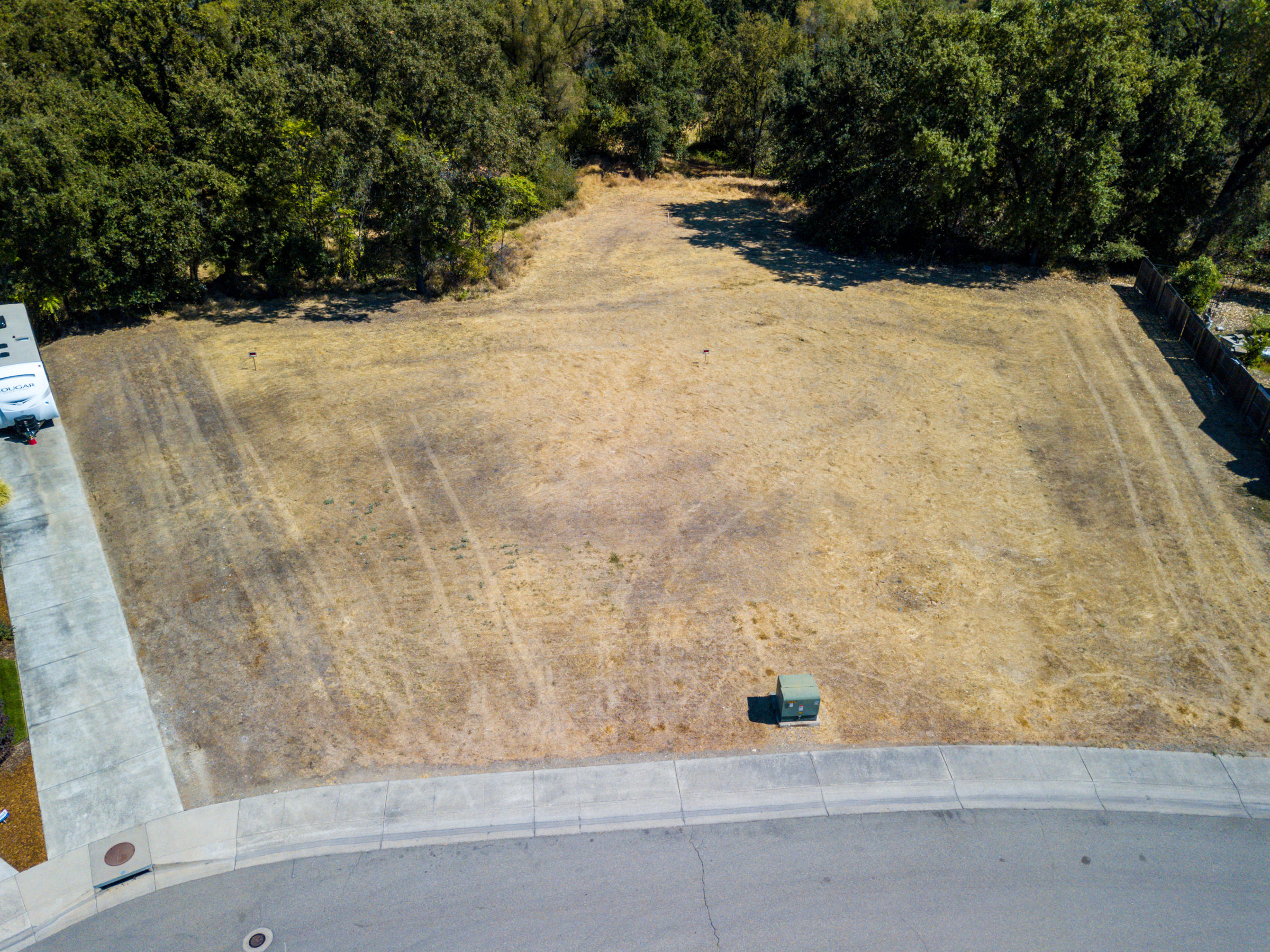 7776 Pit Road Redding, CA 96001 - Photo 17 of 24 a view of a yard with trees