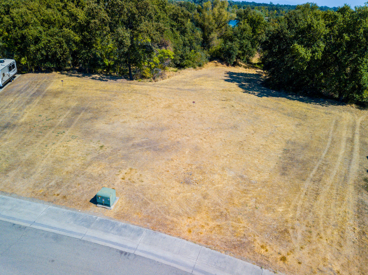7776 Pit Road Redding, CA 96001 - Photo 9 of 24 a view of backyard with wooden fence
