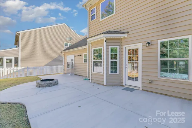 a front view of a house with a large window