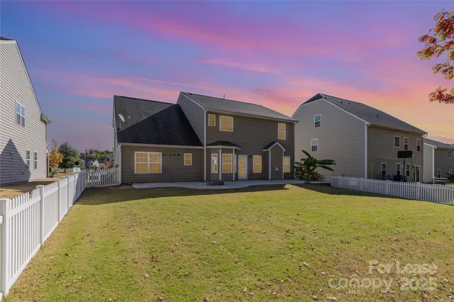 a view of a house with a swimming pool