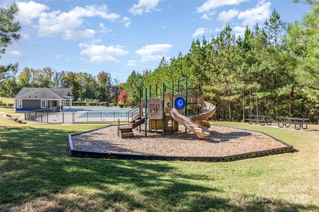 a view of a park with swings
