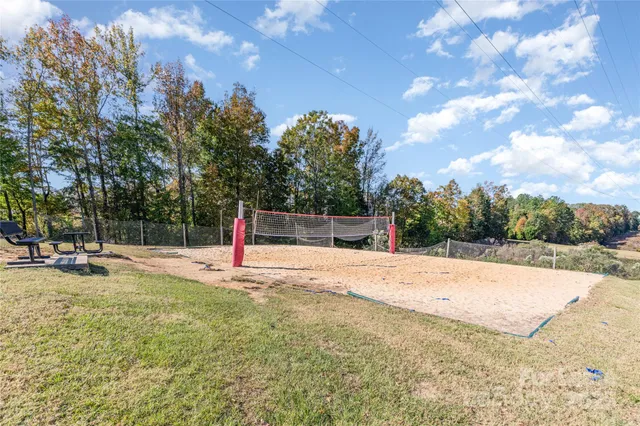 a view of a playground with basketball court