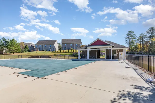 a front view of house with yard and entertaining space