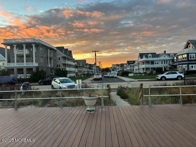 a view of house with roof deck