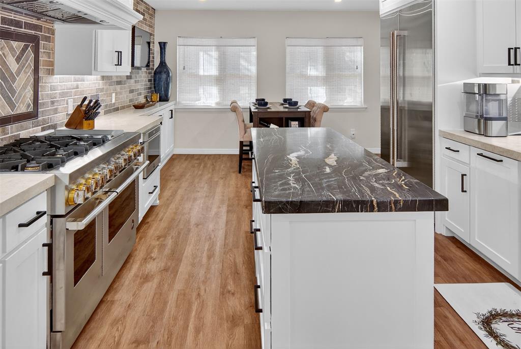 1601 Forum Circle, Unit 147 Graford, TX 76449 - Photo 15 of 38 This kitchen is sleek and modern with the best of everything
