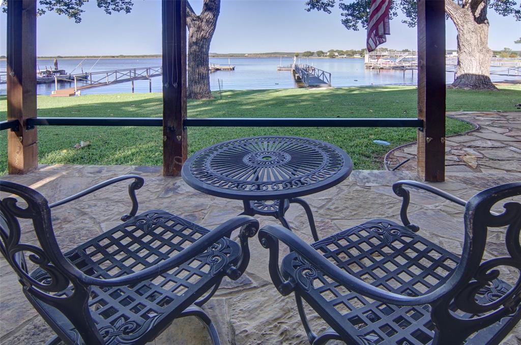 1601 Forum Circle, Unit 147 Graford, TX 76449 - Photo 2 of 38 Morning coffee just tastes better by the lake
