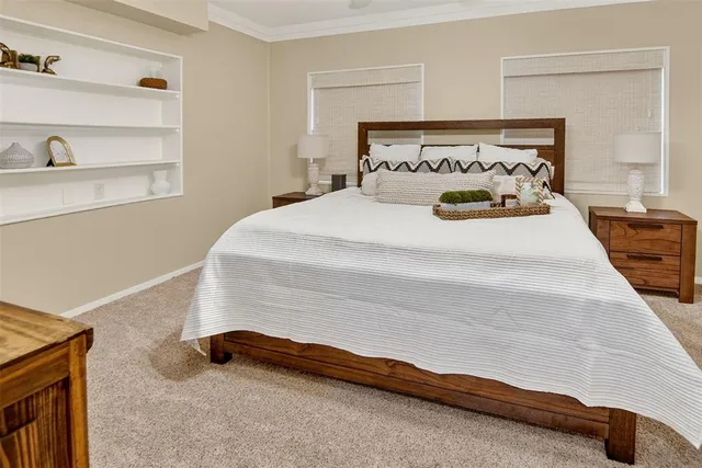 a bedroom with a bed and closet