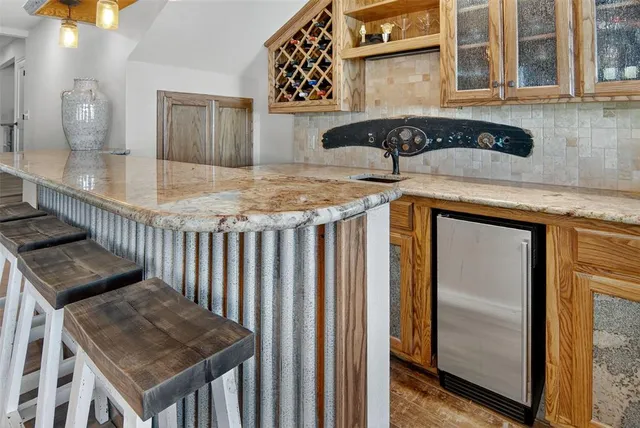 a living room with furniture and a fireplace or television