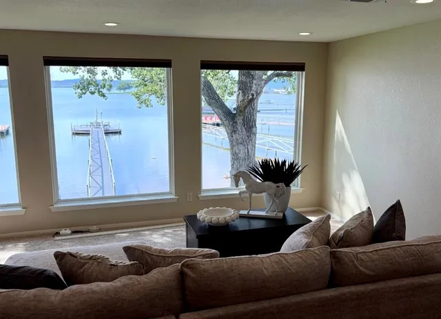 a bedroom with a bed and lamp