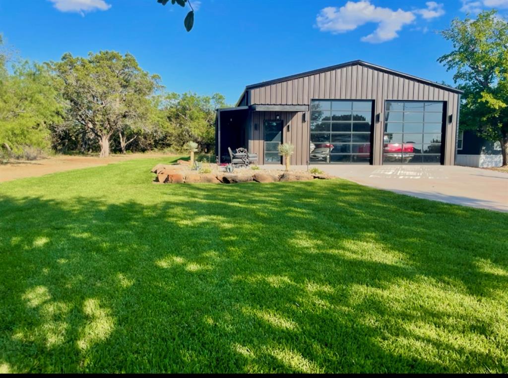 1601 Forum Circle, Unit 147 Graford, TX 76449 - Photo 9 of 38 Beautiful new boat barn is insulated, plumbed and on a large, landscaped lot that gives you so much more room!
