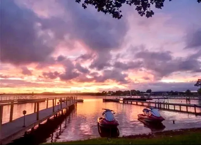 a view of a lake with a lake in the background