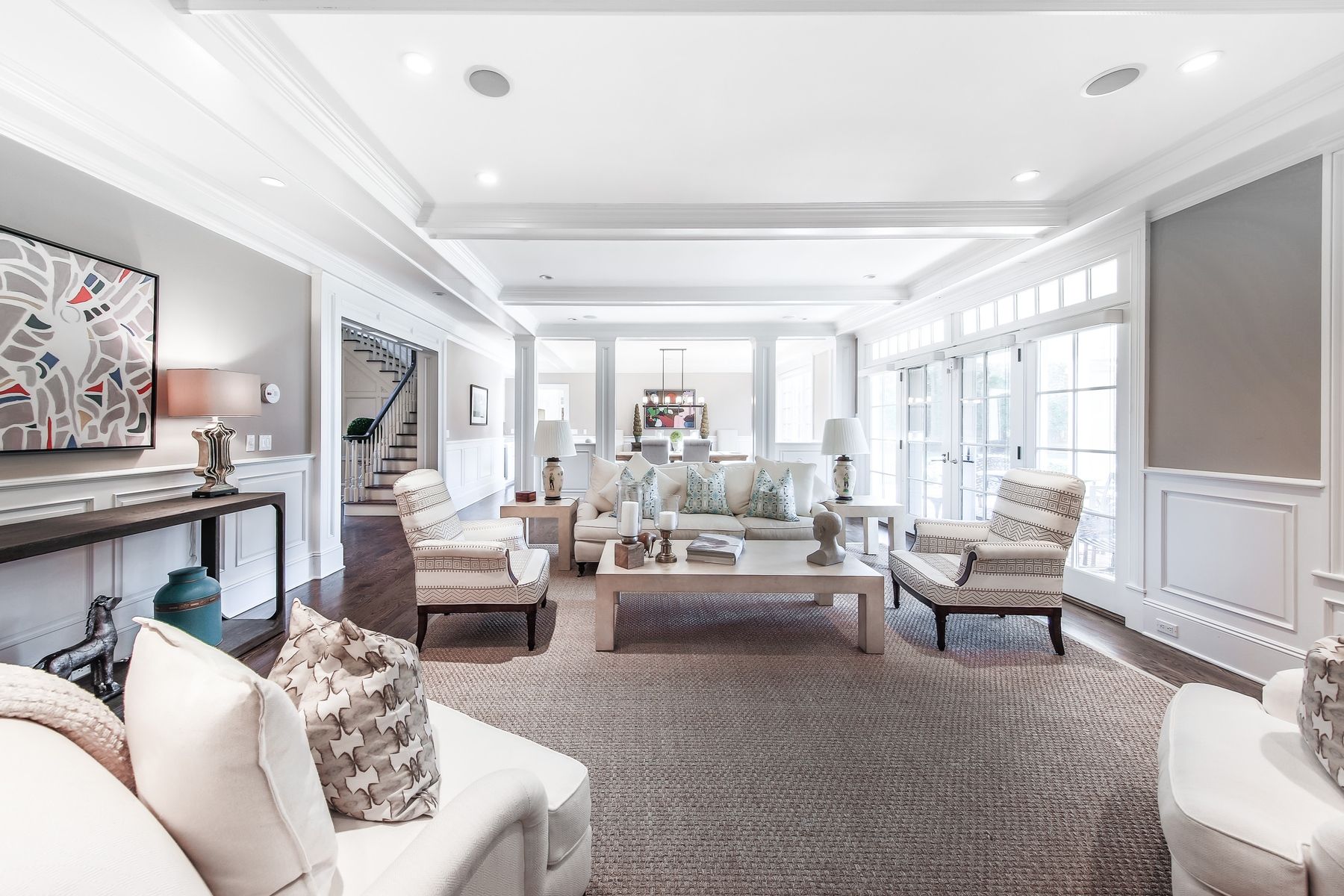 8 Pondview Lane East Hampton, NY 11937 - Photo 1 of 23 a living room with furniture and a large window