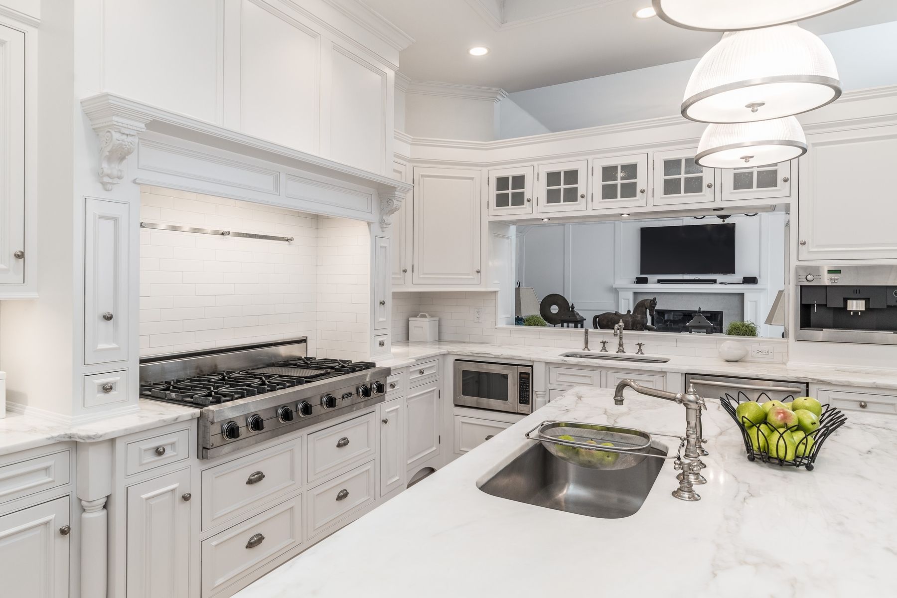 8 Pondview Lane East Hampton, NY 11937 - Photo 13 of 23 a kitchen with stainless steel appliances kitchen island granite countertop a stove and a sink