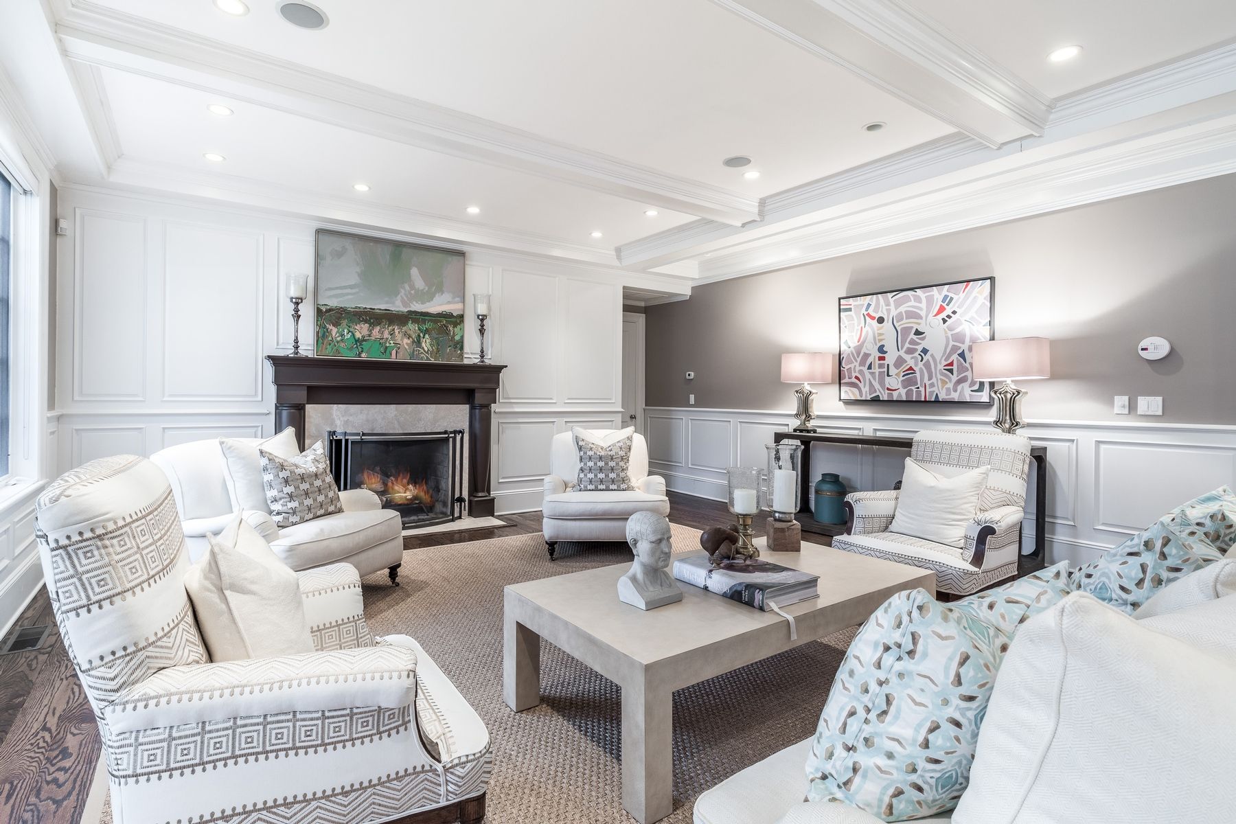 8 Pondview Lane East Hampton, NY 11937 - Photo 8 of 23 a living room with furniture a fireplace and a table