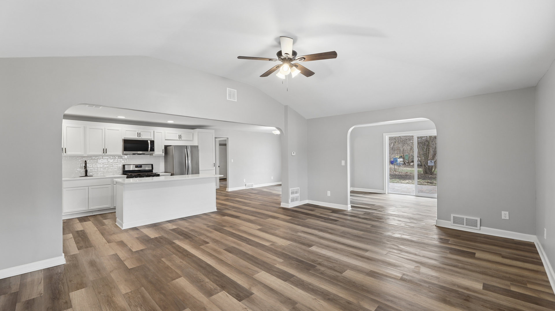 1624 Chicago Street Dixon, IL 61021 - Photo 11 of 29 a view of a living room and kitchen with wooden floor