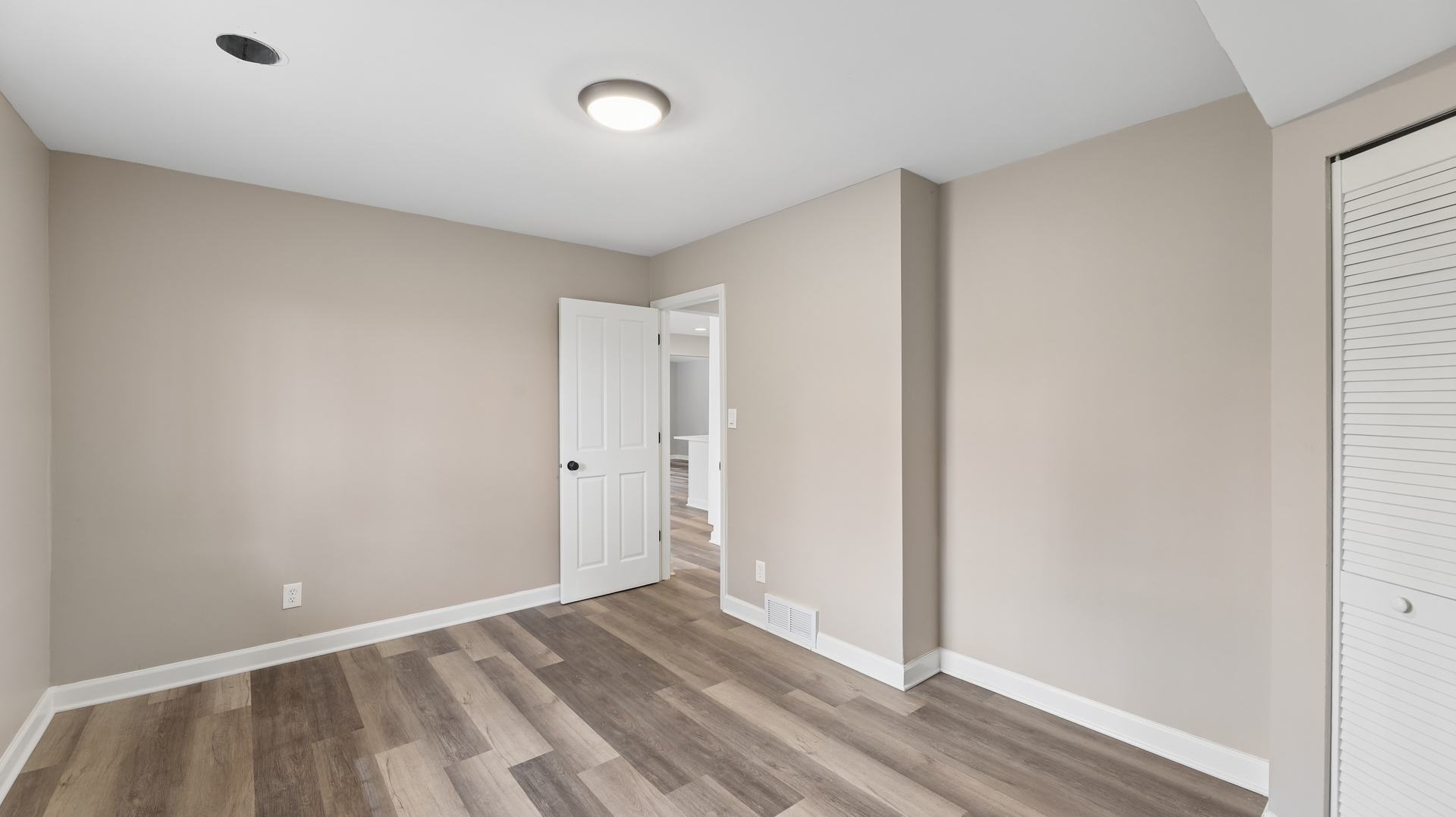 1624 Chicago Street Dixon, IL 61021 - Photo 23 of 29 a view of an empty room and wooden floor