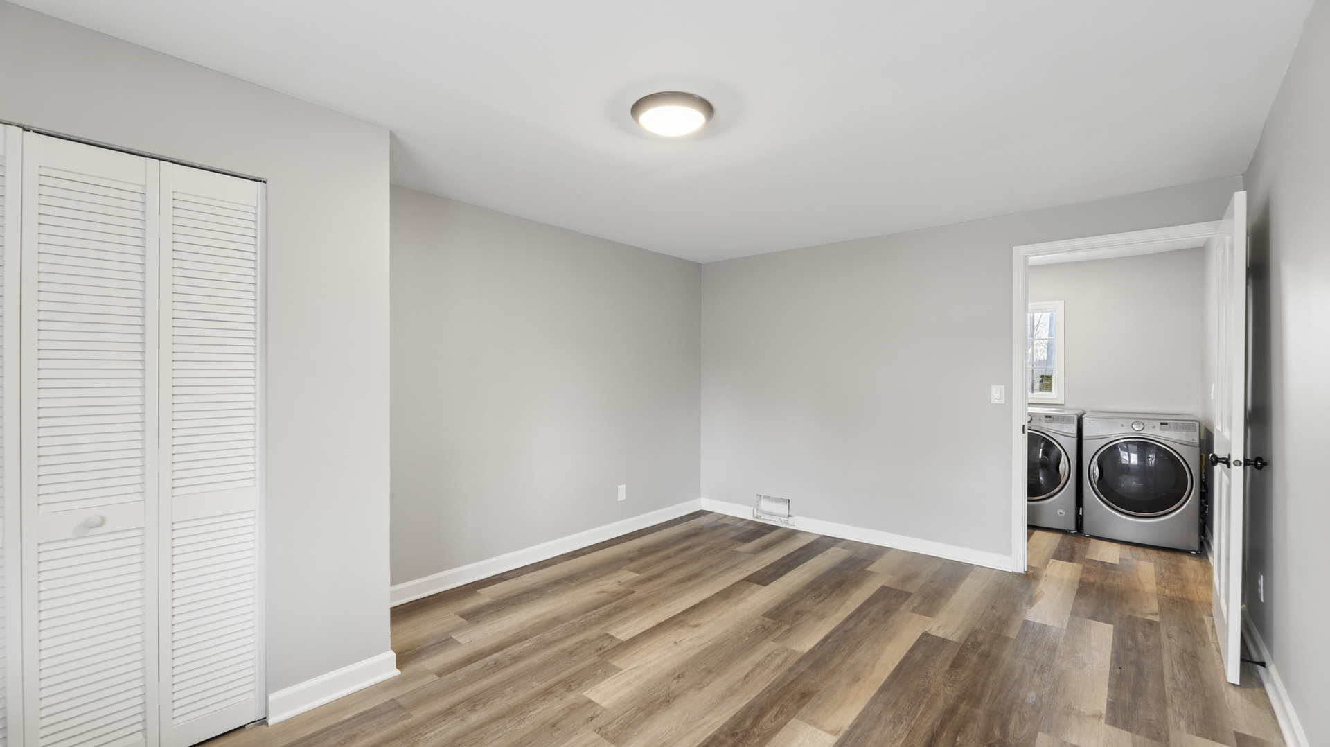 1624 Chicago Street Dixon, IL 61021 - Photo 27 of 29 a view of a storage & utility room with wooden floor