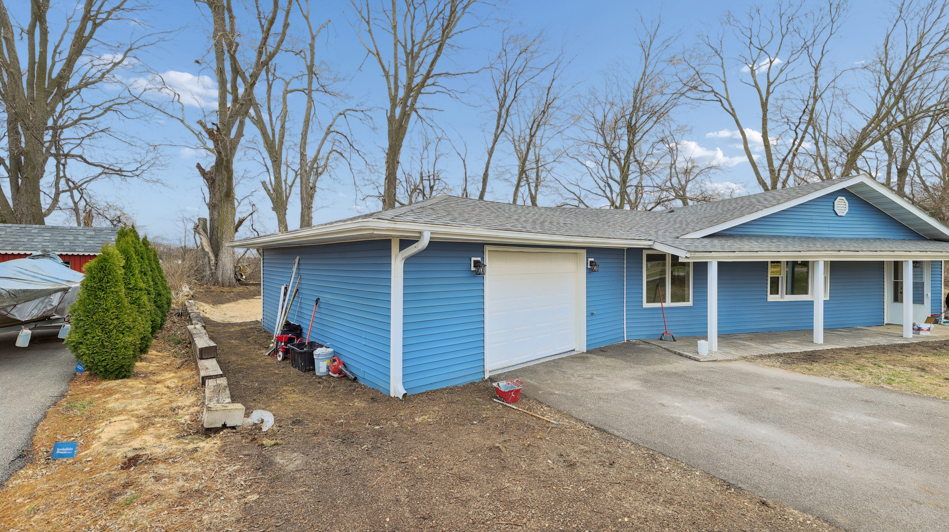 1624 Chicago Street Dixon, IL 61021 - Photo 6 of 29 a view of a house with a yard and garage
