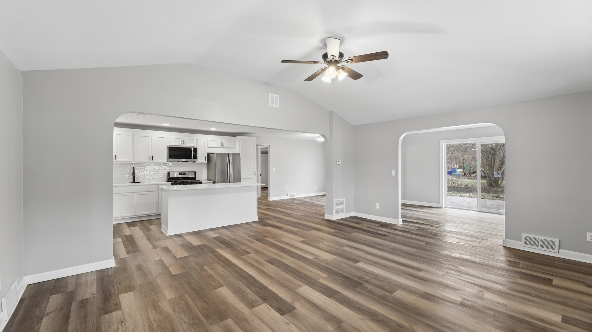 1624 Chicago Street Dixon, IL 61021 - Photo 10 of 29 a view of a kitchen with kitchen island a sink stainless steel appliances and cabinets