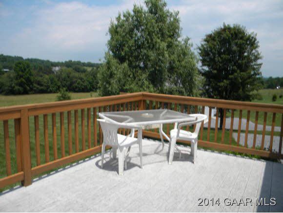 315 Todd Road Mount Sidney, VA 24467 - Photo 15 of 17 a view of a roof deck with wooden floor and fence
