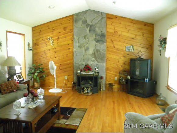 315 Todd Road Mount Sidney, VA 24467 - Photo 2 of 17 a living room with furniture and a fireplace