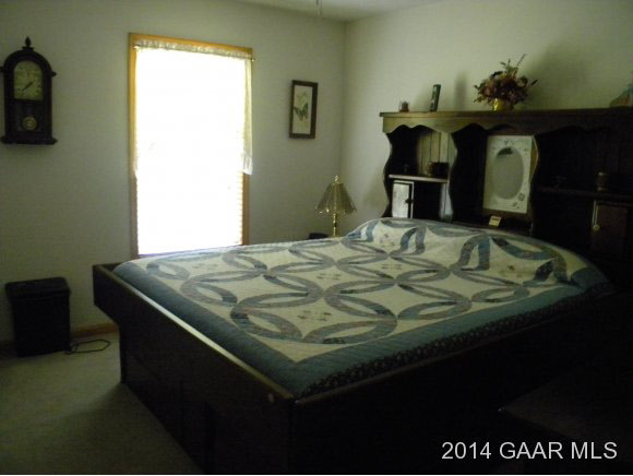 315 Todd Road Mount Sidney, VA 24467 - Photo 8 of 17 a bedroom with a bed and dresser