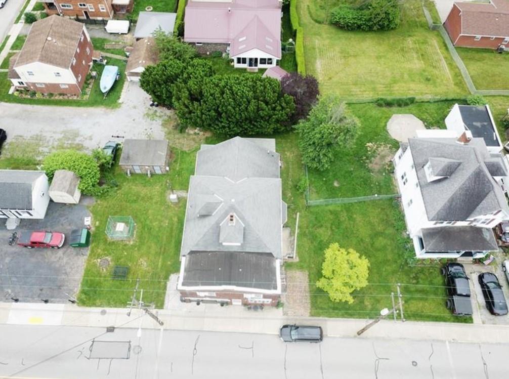 626-628 Pittsburgh Street Springdale, PA 15144 - Photo 8 of 34 an aerial view of a house with outdoor space