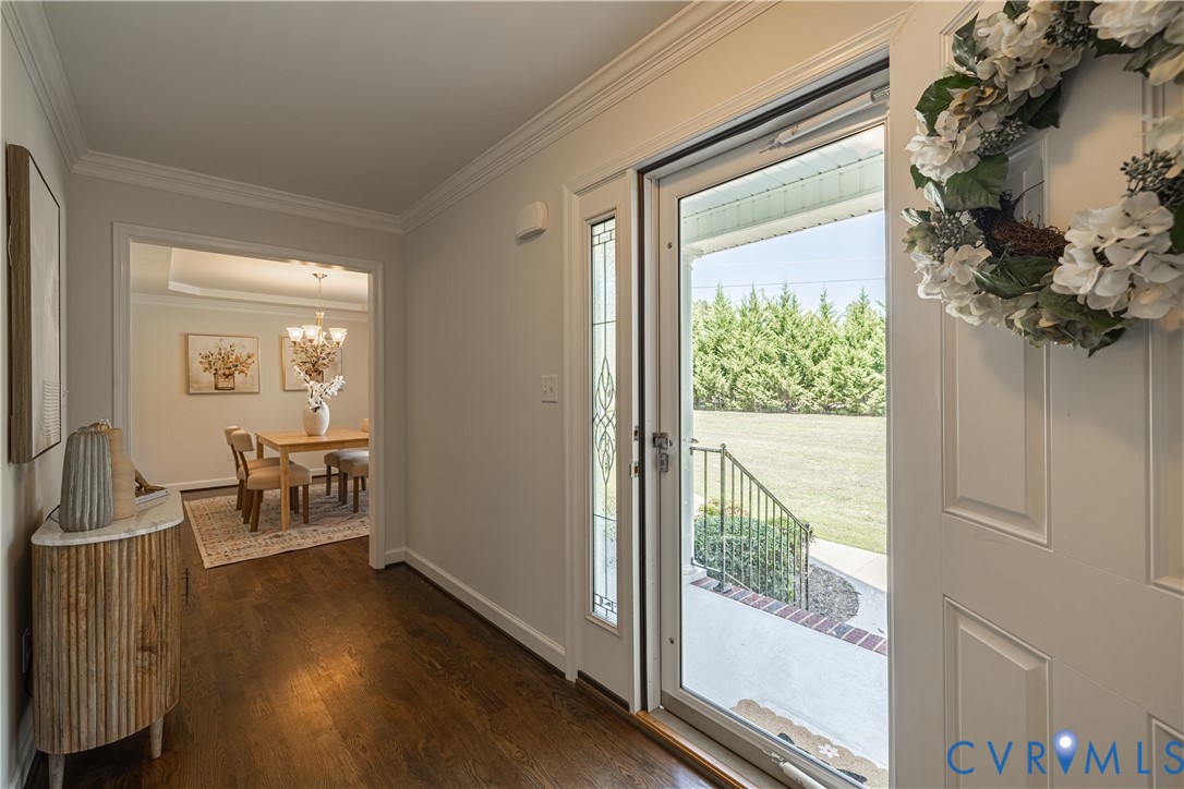 Hardwood-finish flooring throughout, crown molding